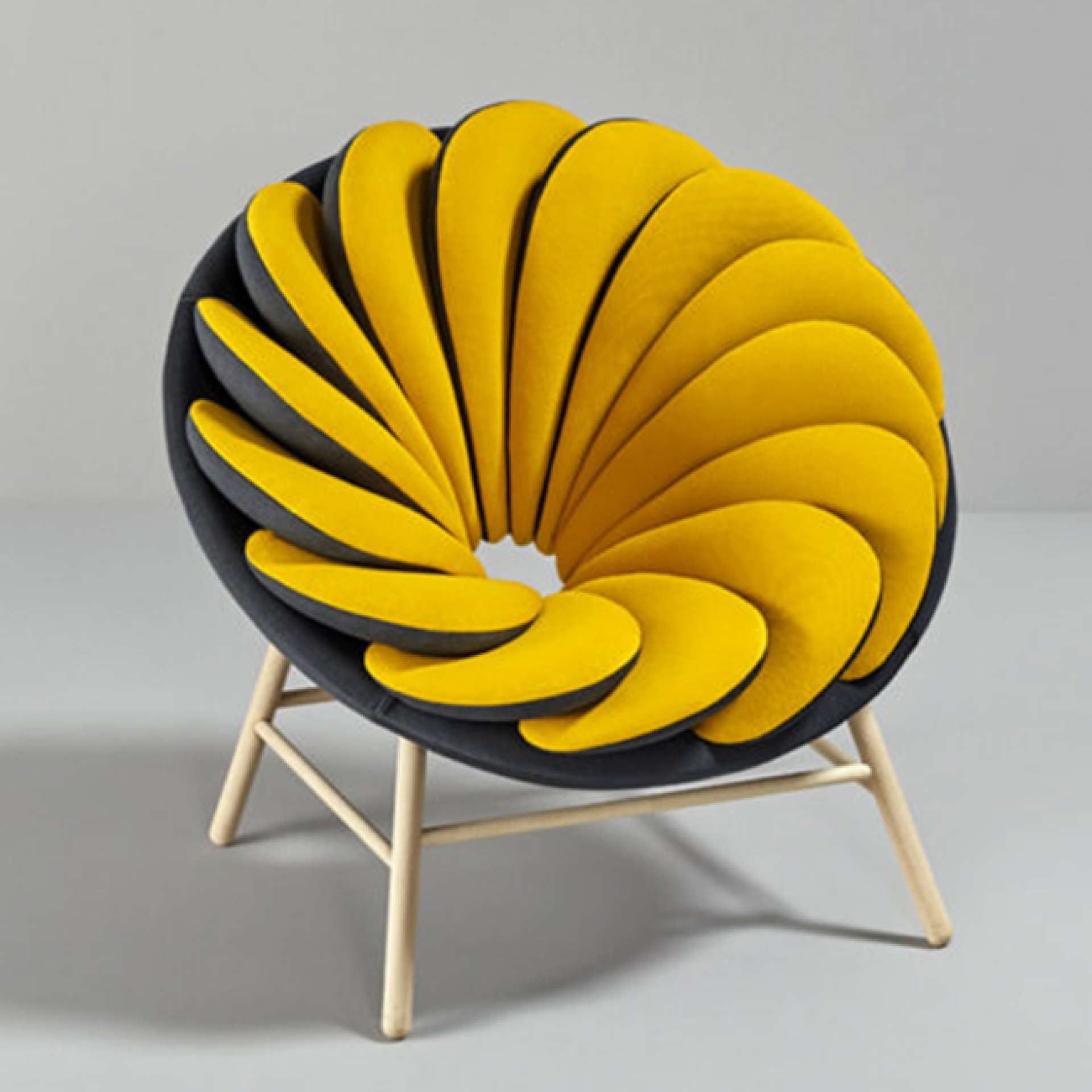 A chair inspired by feathers: Quetzal by Marc Venot